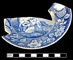 Pearlware printed underglaze saucer in pastoral motif. Rim diameter: 5.75”. Lot: 7, Provenience: 1G2.458.2, Privy Stratum 2.-18BC38